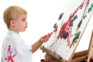 Young boy painting blood splatter - a young boy free wallpaper