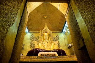 Golden buddha statue ceiling fan - white wall free wallpaper