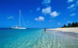 Boat water beach clear blue - the water near a beach free wallpaper