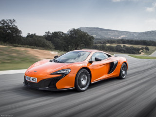 Orange sports car driving hills - hill free wallpaper