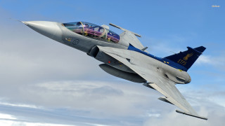 Fighter jet cloudy sky man - a cloudy blue sky free wallpaper