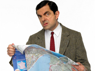 Man suit map passport surprised - a man in a suit holding free wallpaper