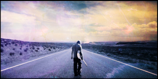 Man skateboarding road cloudy sky - a road under a cloudy sky free wallpaper