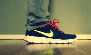 Person wooden floor shoes tennis - a pair of shoes free wallpaper