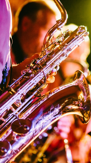 Close up person playing instrument - funk art free wallpaper for mobile