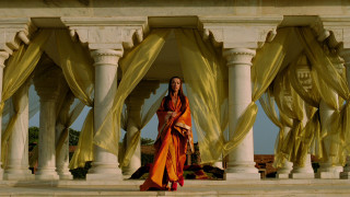 Woman yellow dress white building - the side of the building free wallpaper for desktop