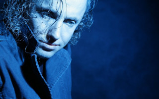 Man curly hair blue shirt 2 - his hip free wallpaper for desktop
