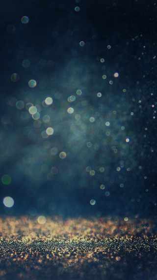 Gold glitter blurry sky background 2 - a blurry photo free wallpaper for mobile