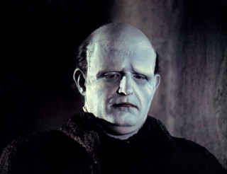 Bald man black sweater serious - bald free wallpaper