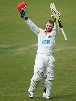 Man holding bat helmet grass 2 - bradley walker tomlin free wallpaper for mobile
