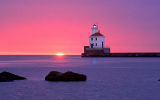 Lighthouse rock ocean sunset sky 2 - a rock in the ocean free wallpaper