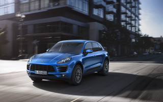 Blue porsche macan city street - a tall building free wallpaper for desktop