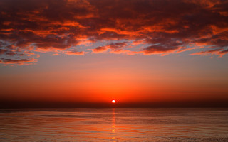 Sunset ocean boat red sky 3 - a red sky free wallpaper for desktop