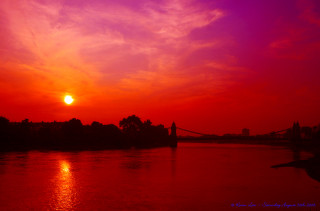Sunset river bridge red sky - a sunset over a river free wallpaper