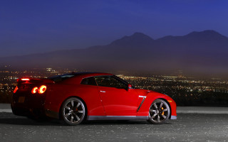 Red sports car city night 2 - rim free wallpaper
