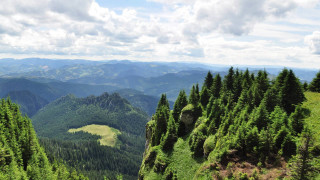 Valley trees mountains clouds sky 2 - a view of a valley free wallpaper for desktop