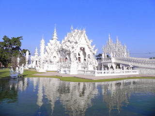 White building pond sky tilt - a pond in front free wallpaper
