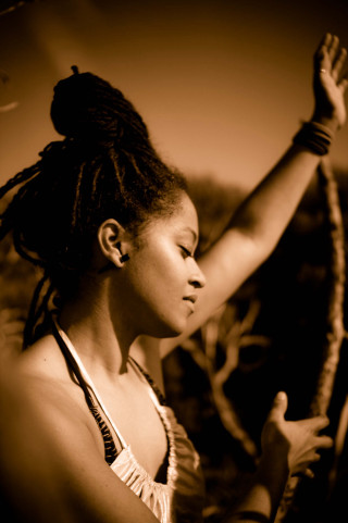 Woman dreadlocks holding rope looking - black arts movement free wallpaper for mobile