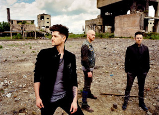 Men group dirty field building - daylight free wallpaper