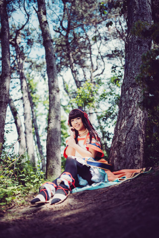 Woman sitting blanket woods trees - free forest wallpaper for mobile