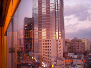 City view window dusk building - a view of a city free wallpaper