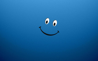 Blue background smiley face black - a smiley face free wallpaper