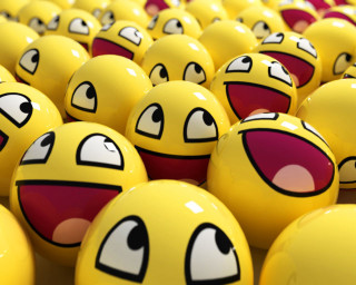 Yellow balls faces painted group - cheerful free wallpaper