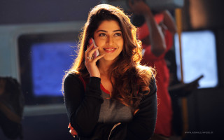 Woman talking cell phone window 2 - a cell phone free wallpaper