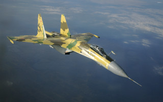 Fighter jet flying sky clouds 6 - the side of the jet free wallpaper