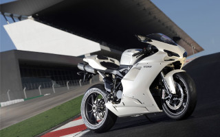 White motorcycle race track building - area free wallpaper