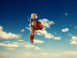 Woman flying bikini red cape - a bikini free wallpaper