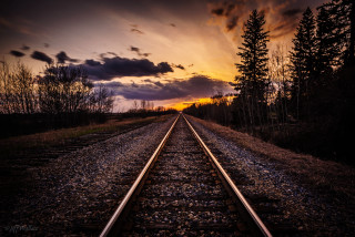 Train track sunset clouds sky - tree and grass free wallpaper