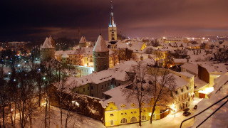 Snowy city nighttime buildings lights - medieval free wallpaper for desktop
