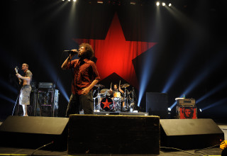 Band performing stage star red - a red star free wallpaper
