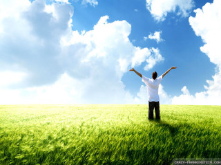 Man standing field arms outstretched - blue sky free wallpaper for desktop