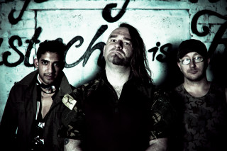 Men standing graffiti wall sign - biomechanical free wallpaper