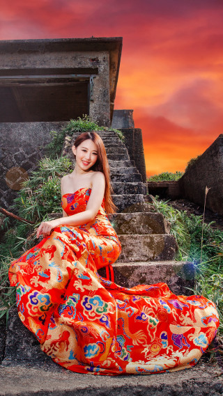 Red dress sitting portrait sunset - synthetism free wallpaper for mobile