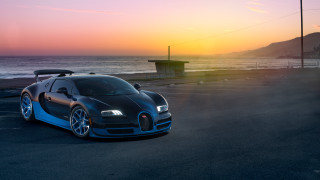 Bugatti car parked ocean sunset - sunrise time free wallpaper