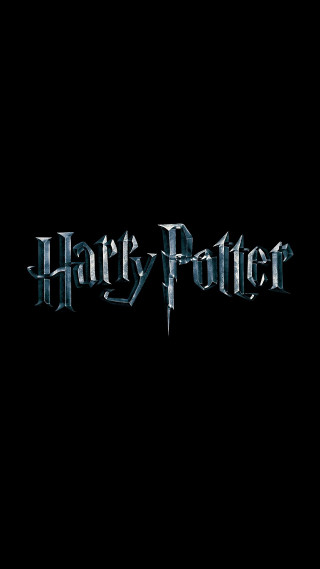 Harry potter logo black background - the middle of the image free wallpaper