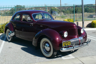 Classic car parking lot fence - a classic car free wallpaper