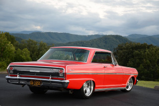 Red car parked road forest 2 - f 8 aperture free wallpaper