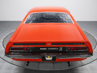 Red car showroom glass display - back view free wallpaper