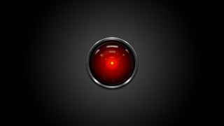 Red button black background red 2 - a red light in the middle of it free wallpaper