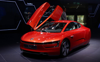 Red car hood open showroom - its hood free wallpaper