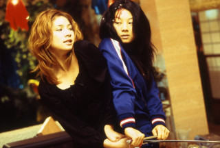 Two women motorcycle city street - eizan kikukawa free wallpaper