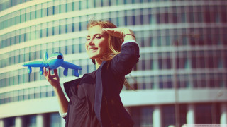 Woman toy airplane building background - anka zhuravleva free wallpaper
