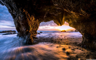 Cave sunset water ocean entrance - a cave free wallpaper
