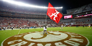 Man holding flag field stadium - a. b. jackson free wallpaper