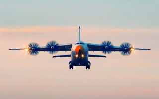 Jetliner flying cloudy sky lights - a large jetliner free wallpaper