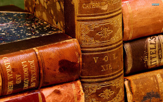 Old books stack table wall - a table next free wallpaper